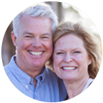 Happy Couple Showing Off their Smiles at the Dentist